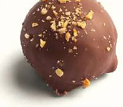 Figue Cacahuètes : figue séchée fourrée, praliné cacahuètes, enrobée de chocolat