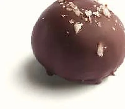 Figue Noix de Coco : figue séchée fourrée, ganache coco, enrobée de chocolat