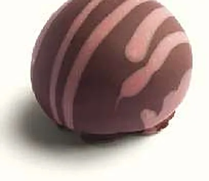 Figue Framboise : figue séchée fourrée, ganache framboise, enrobée de chocolat