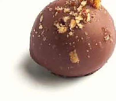 Figue Noix de Pécan : figue séchée fourrée, praliné noix de pécan, enrobée de chocolat