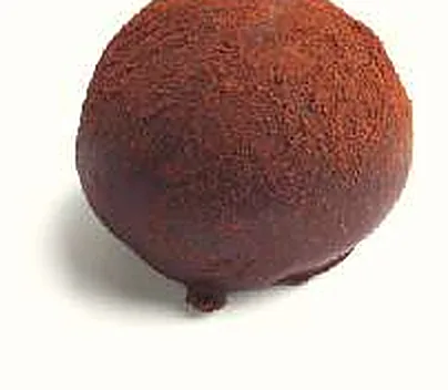 Figue Truffe : figue séchée fourrée, ganache truffe, enrobée de chocolat