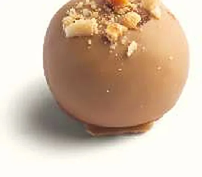 Figue Vanille : figue séchée fourrée, ganache vanille, enrobée de chocolat